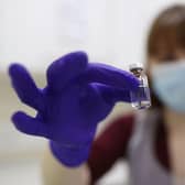 An NHS pharmacy technician simulates the preparation of the Pfizer vaccine to support staff training ahead of the rollout (Photo by Yui Mok - WPA Pool/Getty Images)