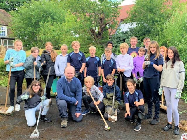 Some of the Year 7 Changemakers doing a spot of gardening