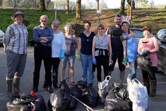 Litter pickers come together to keep Hogshaw, a much-loved green space, in shape. (Picture taken before the pandemic)