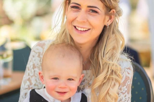 Charlotte and her baby son Maximus, who is only one year old, pictured on her wedding day in the summer. Photo submitted