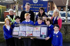 High Peak Borough Councillor Sally Depee meeting with school kids at Chapel-en le frith primary school, MP Jonathan Pearce and PCSO to launch a safe parking campaign. Photo Brian Eyre