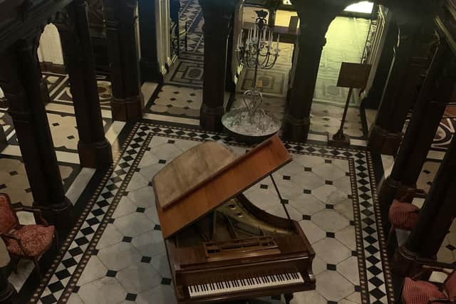 Looking down on the grand piano at Crewe Hall.