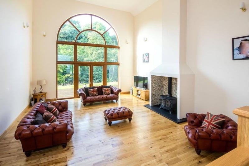 This stunning seven bedroom, five bathroom home boasts an eye-catching picture window in the drawing room.