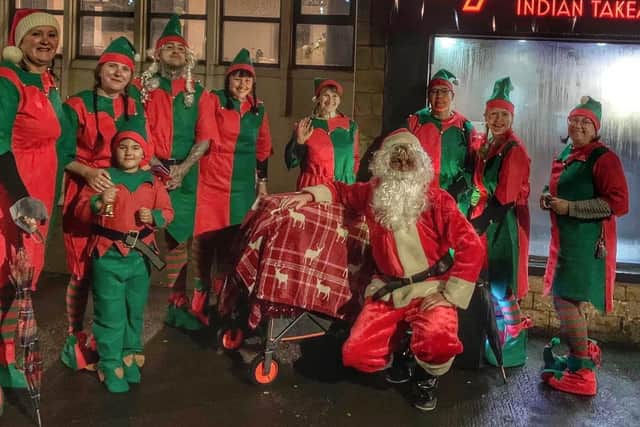 Santa Claus is coming to town! Father Christmas made an appearance at the New Mills switch on