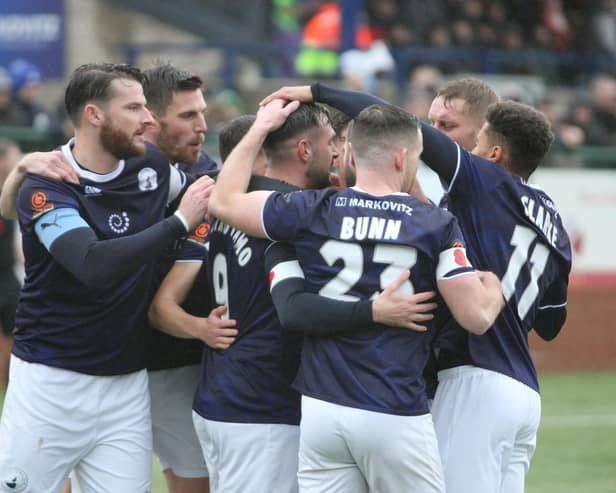 Buxton celebrating the opening goal on Saturday against Merthyr.