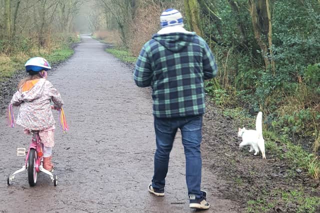 Willow Hibbert with Link and dad Benjamin on Sett Valley Trail