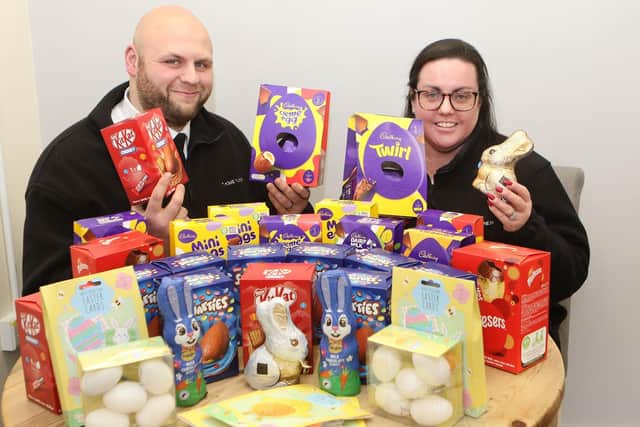 Emma and James Howe at JT Howe Funeral Directors with their annual Easter Egg collection