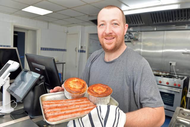 Home made pies and local sausages on sale at the Master Fryer on Albion Road New Mills. Photo Brian Eyre