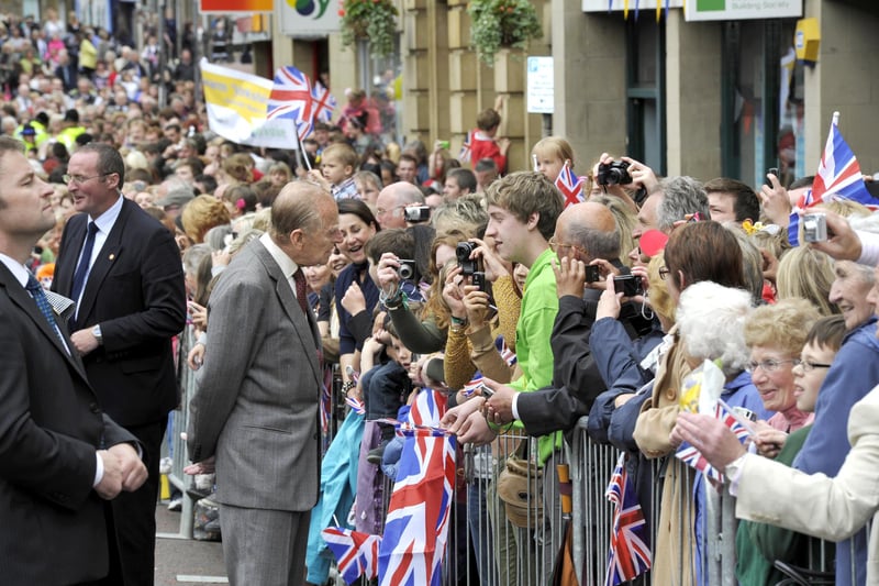 The Duke of Edinburgh spending time talking to the crowds in Alnwick town centre.
