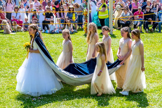 Carrying the train for the Queen at the 2022 Hayfield May Queen crowning. Picture Anthony McKeown