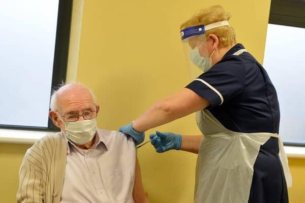 Army veteran Robert Stopford-Taylor, 101, was the first person to receive the vaccine at Stubley Medical Centre in Dronfield Woodhouse, where the number of cases is falling. Picture by Brian Eyre.