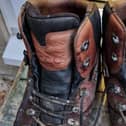 Mystery boots left in Hayfield gone to a homeless charity. Photo submitted