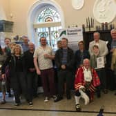 Town crier Bill Weston with representatives from Transition Buxton and plastic champions from across the town.