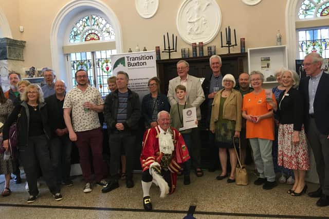 Town crier Bill Weston with representatives from Transition Buxton and plastic champions from across the town.
