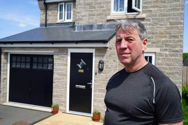 Jon Gledhill bought a new house 2022 in three years it has leaked/ flooded twice the building is cracked collapsing. Photo Brian Eyre