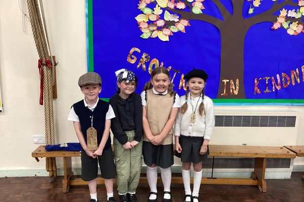 Pupils dressed up in wartime clothing