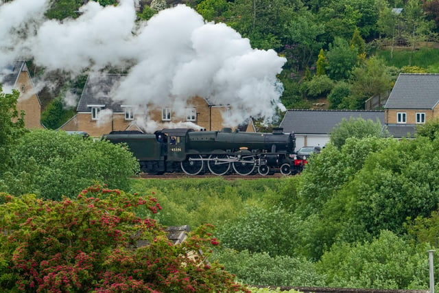 Steaming past the houses. Photo - Andy Gregory