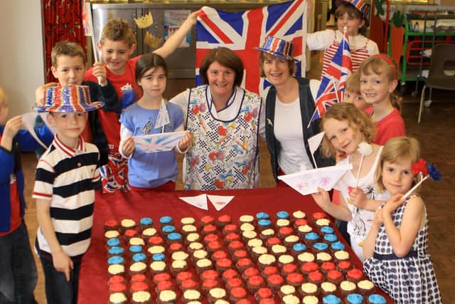 Jubilee, Taxal and Fernilee Primary with their giant cupcake flag for the Diamond Jubilee in 2012