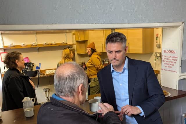 MP Jon Pearce at one his drop in services for elderly people.