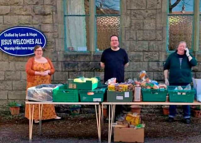 Cath Sterndale with son Dan, daughter Steph and food to be distributed to people in need during the pandemic.