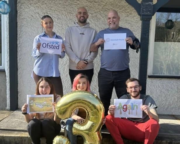 Members of the Dovedale House team celebrate their triple-outstanding rating.