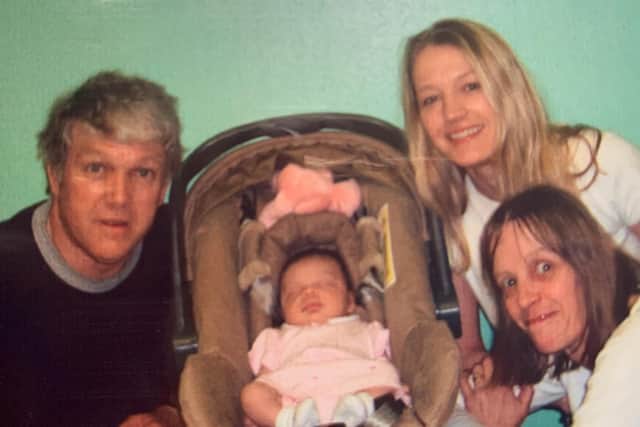 Alan pictured with his family.