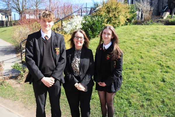 Headteacher, Heather Watts with Head Students Arthur Fisher and Maddy Hampson celebrating the school's 'good' Ofsted rating. Photo submitted