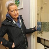 Rebecca Blunden in her wrecked flat which was flooded with human excrement