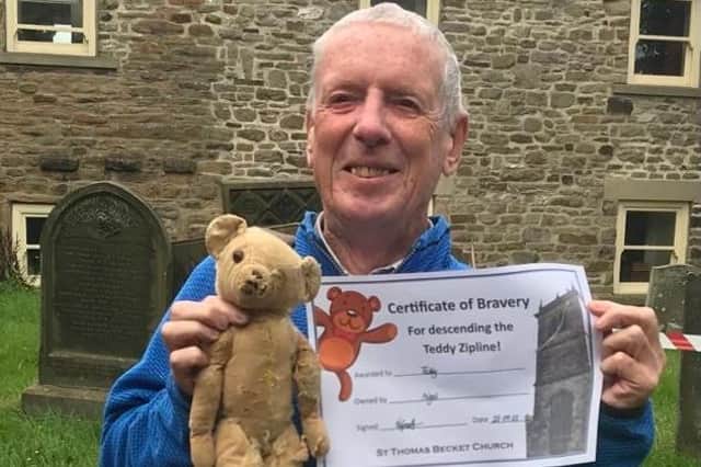 Nigel and his 70 year old teddy after going down the zipline at St Thomas Beckett church. Photo submitted