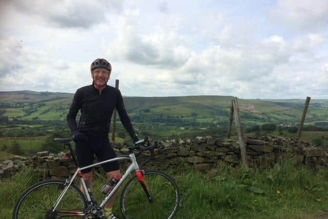 A Cyclist Enjoying The Hope Valley, Near Harthersage, In Derbyshire'S Peak District