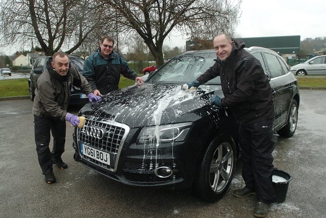 John Simpson, Keith Mathers and Nick Bennett washing cars in 2013. Photo Jason Chadwick
