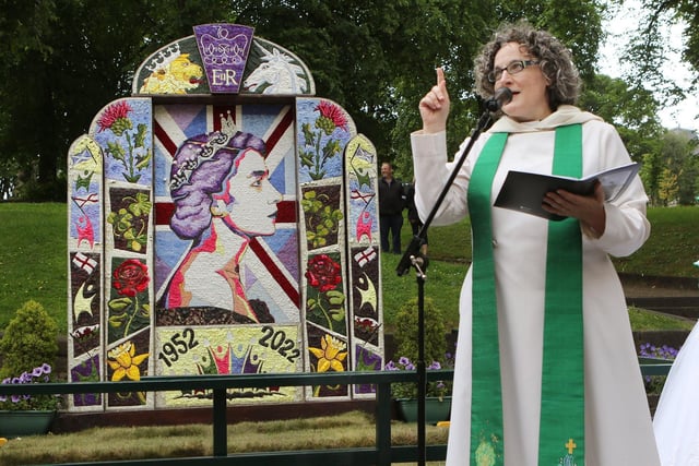 Rev Liz England at St Ann's Well which was dressed to celebrate the Queen's Platinum Jubilee