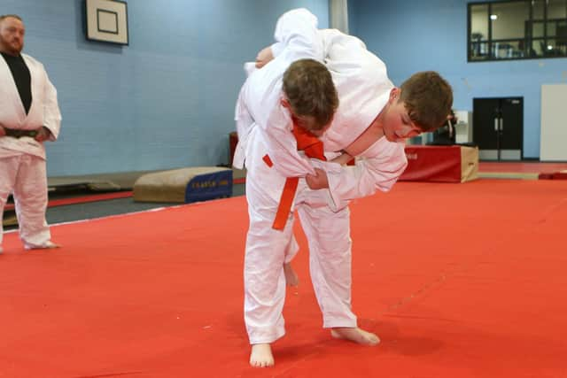 Adam watches some of students going through their paces. Photo Jason Chadwick