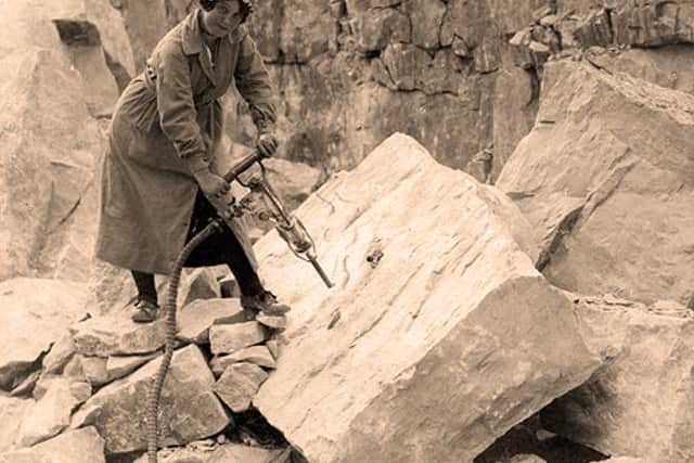 A female quarry worker in WW1