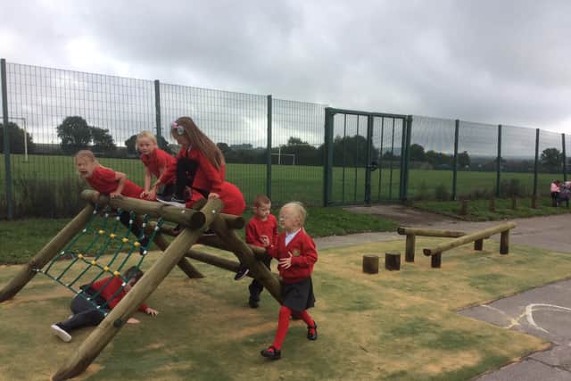 Children at Fairfield Infant and Nursery School playing on the new equipment they raised funds for. Pic submitted
