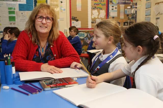 St Mary's RC Primary, headteacher Patricia Chapman with year six pupils. Pic Jason Chadwick.