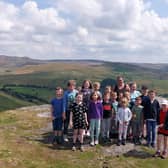 The children from Little Jules in New Mills at the top of Big Stone, one of the five sponsored walks they are doing to raise funds for a defibrillator.