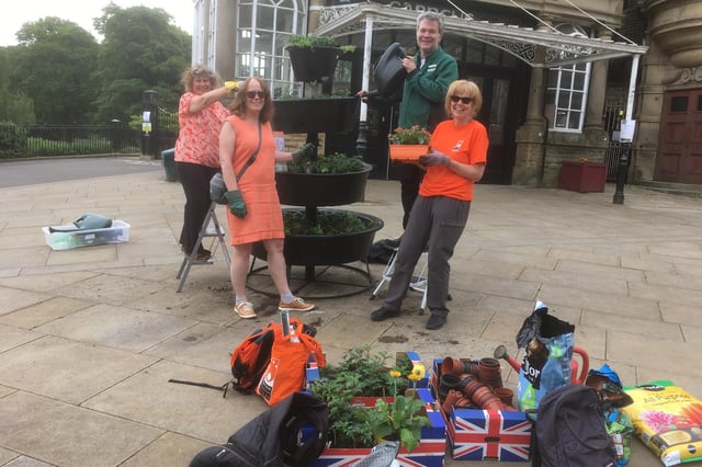 Clockwise from left, Carole Garner, Rob Harrison, Sandra Jowett and Pam Mason brightening up the opera house.