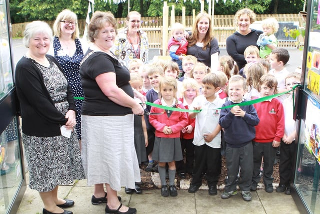 Parish council chairman Eva Hodgson opened the new outdoor play area for reception pupils at Hayfield Primary school more than 10 years ago. Photo Jason Chadwick