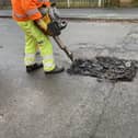 Pictured Is A Derbyshire County Council Worker Repairing One Of The Many Potholes On The County'S Roads