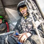 Harvey Gallemore in the cockpit with his dad, Alex, alongside him.