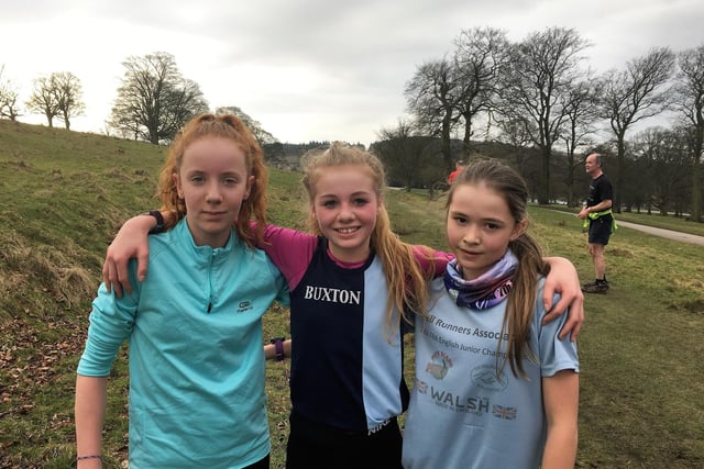 Three Buxton runners take a quick break for a picture.