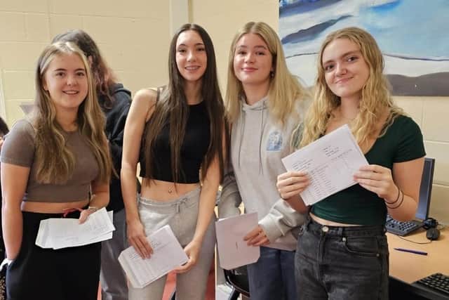 Friends together celebrating GCSE results day at Buxton Community School. Pic BCS