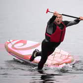 Lib Dem leader Sir Ed Davey falls into lake.