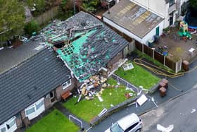 Firefighters and emergency services at the scene in Ollersett Avenue, in New Mills, following the explosion
