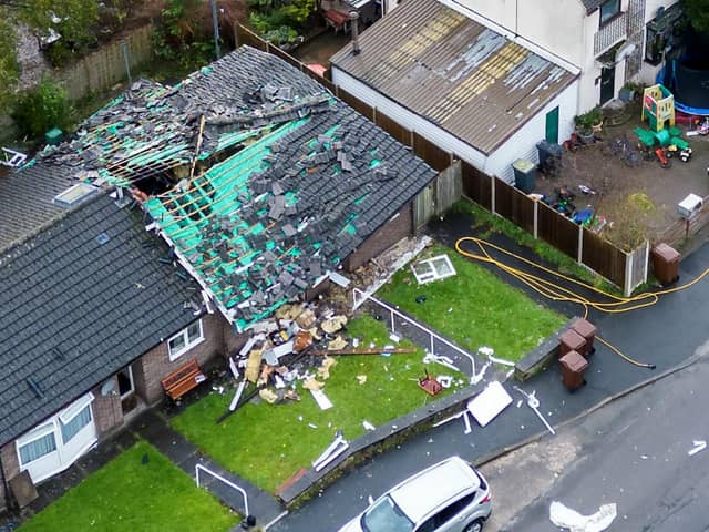 Firefighters and emergency services at the scene in Ollersett Avenue, in New Mills, following the explosion