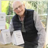 Keith Horncastle with next year's Memory Calendar and some of the early prototypes he and his late wife used to develop the idea