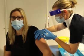 Care home worker Sara Lydon receives her vaccination