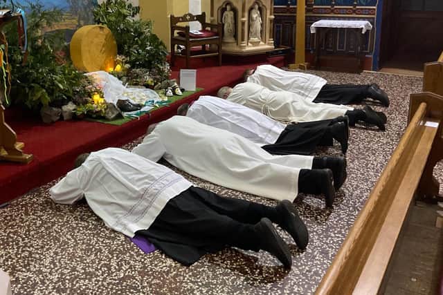 Prostration of clergy at the Day of Prayer for Victims and Survivors of Abuse at St. Anne’s.