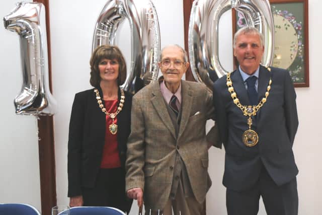 Oliver Gomersal (centre) celebrates his 100th birthday with High Peak Mayor Cllr Paul Hardy and his wife, Mayoress Mary Hardy.